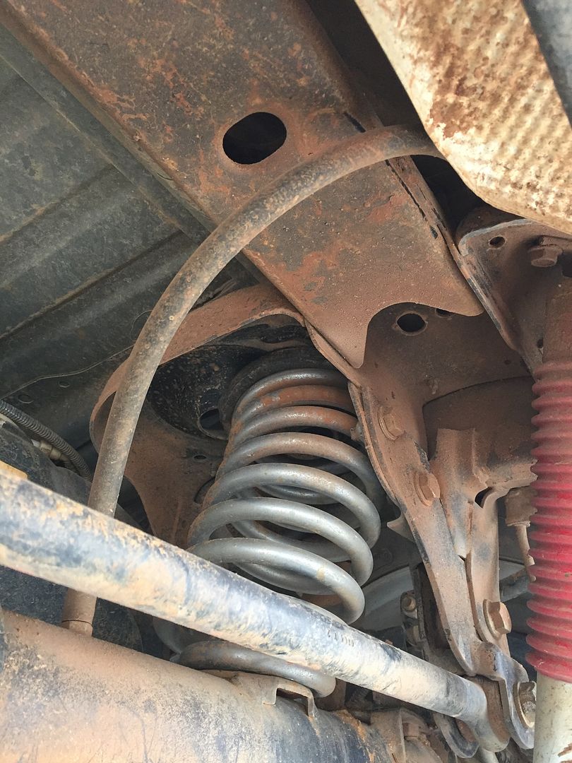 How does rear axle get shifted appx 1.25" to the left? Jeep Wrangler